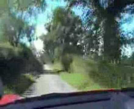 Porsche Cayman S accelerating