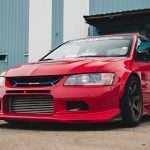Voltex Side Skirts for CT9x Mitsubishi Lancer Evolution VII / VIII / IX [ES-1] on Red Evo - Front-Side View of Car
