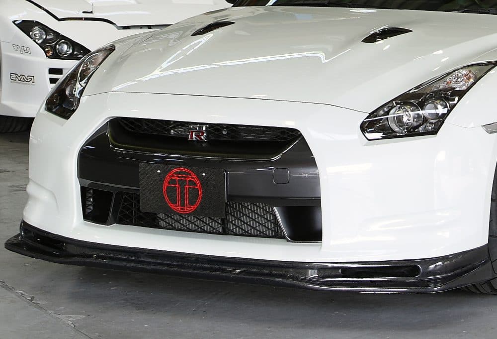 Top Secret Front Diffuser GT-R CBA-R35, Installed on White GT-R - Close Front Side View of Car