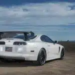 Top Secret Carbon GT Wing A80 Supra, Installed on White Supra - Rear Side View of Car