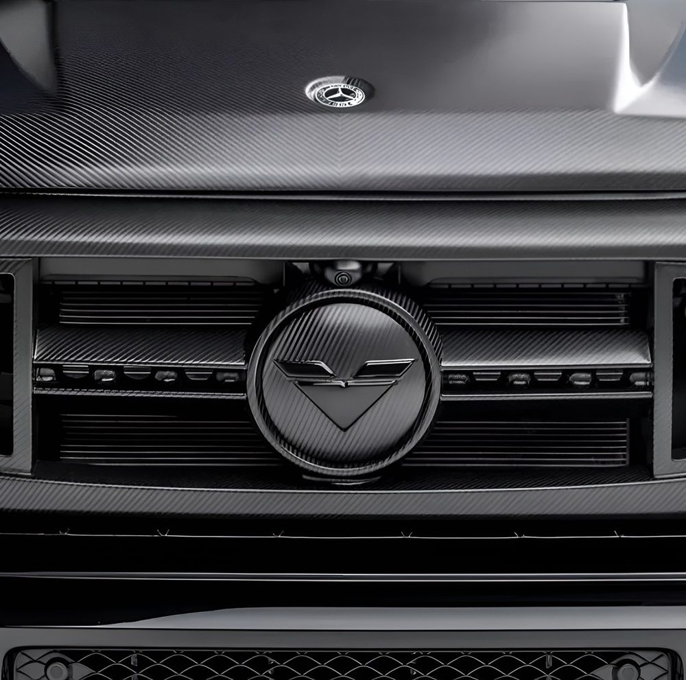 Vorsteiner VRS Program Carbon Front Grille with Center-V Part for W464 Mercedes-AMG G 63 in Satin Finish Installed on Black G 63 - Close Front View of Grille