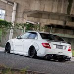 Liberty Walk LB-WORKS Widebody Kit for W204 Mercedes-Benz C63 AMG Installed on White C63 Rear View