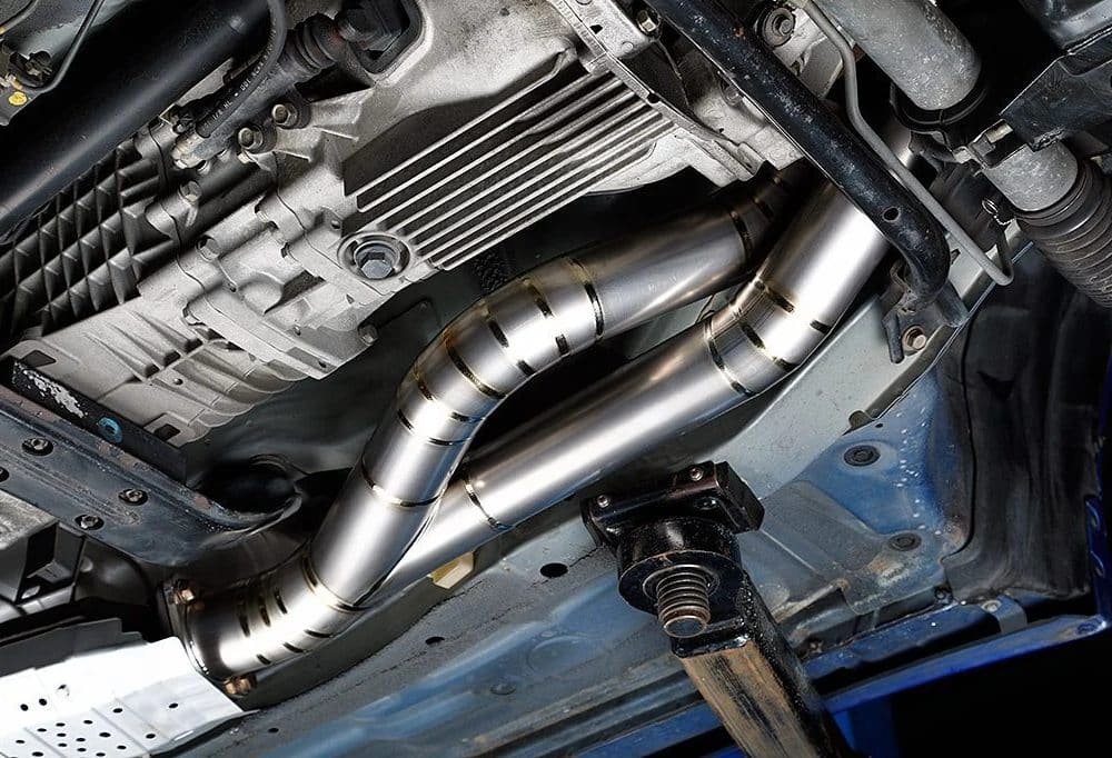 Top Secret Skyline GT-R Front Pipe, Installed on Car on Lift - Underside View of Front Pipe