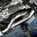 Top Secret Skyline GT-R Front Pipe, Installed on Car on Lift - Underside View of Front Pipe