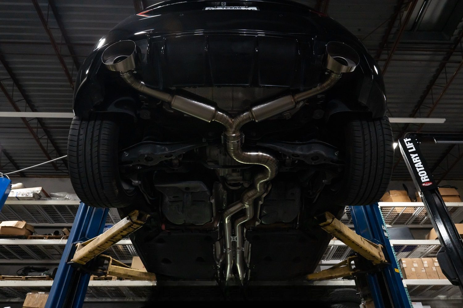 Boost Logic Titanium Exhaust System for 8S Audi TTRS Installed on Lift