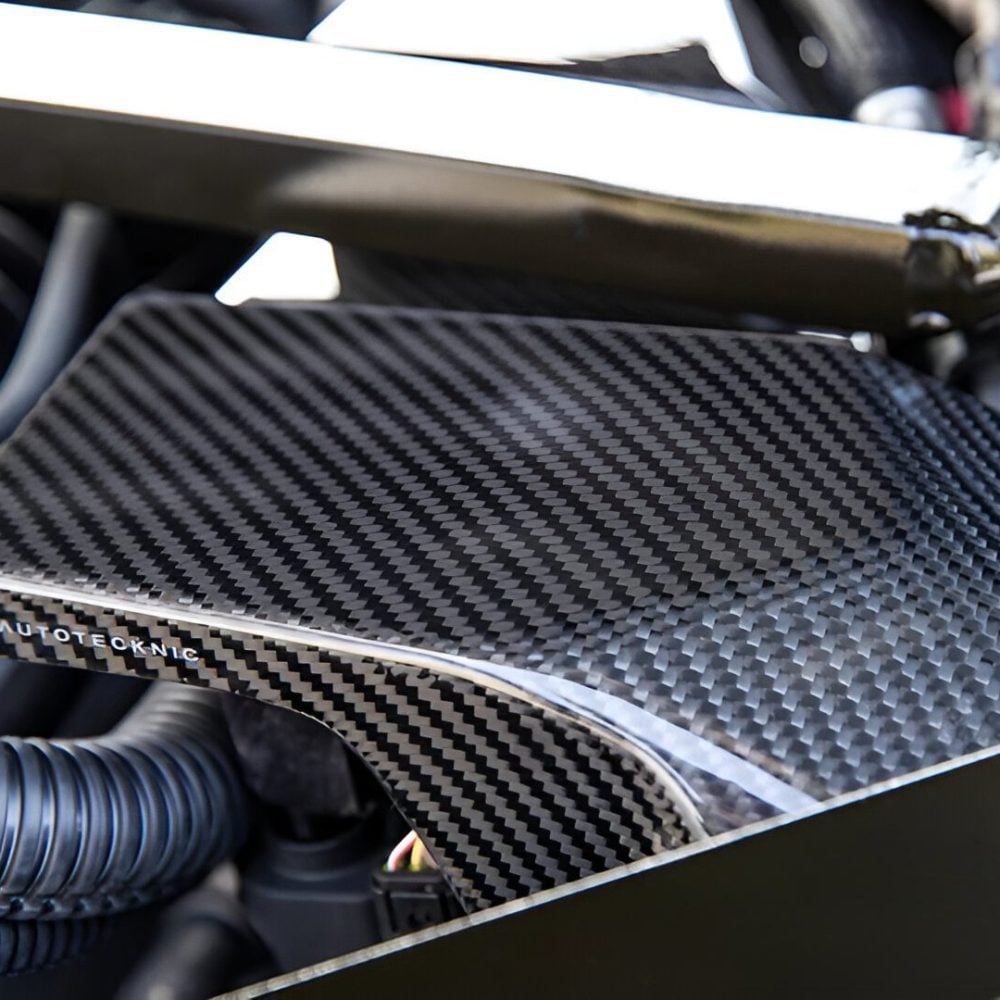 AutoTecknic Dry Carbon ECU Battery Terminal Cover For G87 BMW M2 Installed - Closeup of Carbon Fiber Weave
