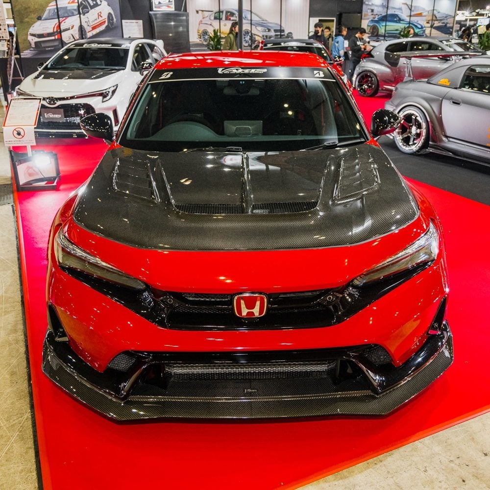 Varis Arising-II Front Bumper for FL5 Honda Civic Type R [VAHO-120] Installed on Red Type R at TAS 2025 - Upper Front View of Car