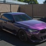 APR Performance Carbon Front Wind Splitter w/ Rods for G42 BMW M240i [CW-520226] Installed on Purple M240i - Front-Side View of Car