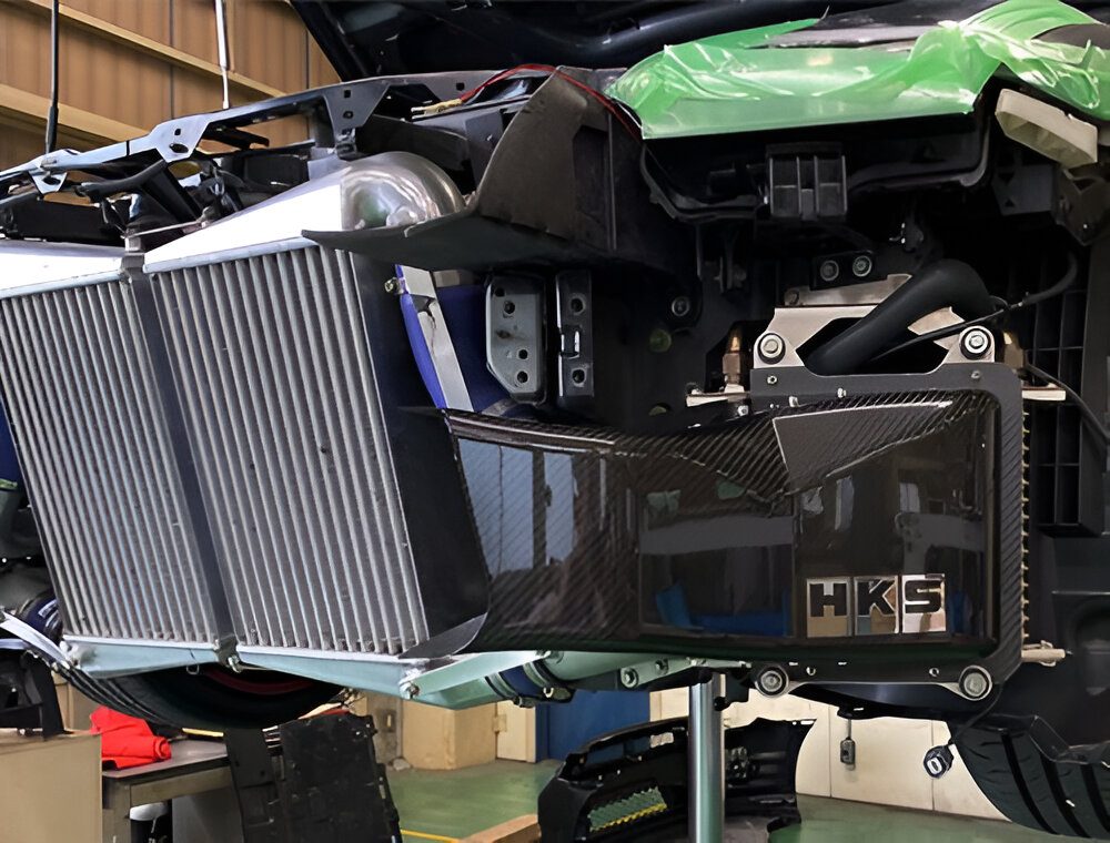 HKS Black DCT Fluid Cooler for EBA-R35 Nissan GT-R [27002-AN105] Installed on Car with Bumper Off