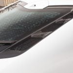 APR Performance Carbon Rear Hatch Vents for C8 Chevrolet Corvette Stingray / Z06 [CBX-C8HATCH] Installed on White Corvette - Close Front-Side View of Vents
