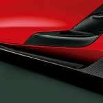 Toyota Gazoo Racing Carbon GR Side Skirts for A90 / A91 Toyota Supra Installed on Red Supra - Close Rear-side View of Side Skirts