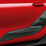 Toyota Gazoo Racing Carbon GR Side Door Garnishes for A90 / A91 Toyota Supra Installed on Red Supra - Close View of Garnishes