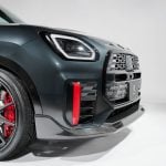 3DDesign Carbon Front Lip Spoiler for U25 MINI Countryman JCW Installed on Dark Grey Countryman JCW - Close Front Side View of Front Bumper