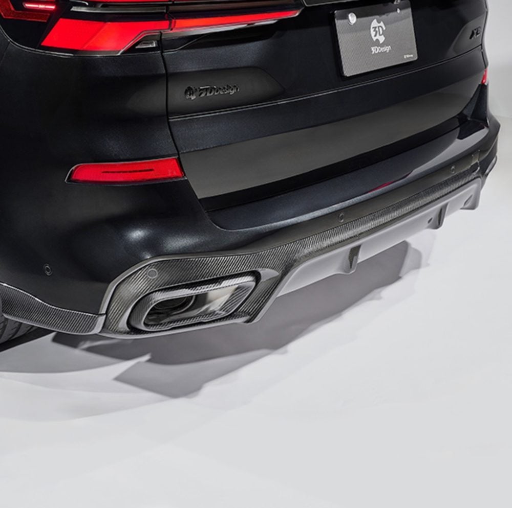3DDesign Carbon Rear Diffuser for G05 BMW X5 (facelift) Installed on Dark Grey X5 - Close Rear Side View of Diffuser