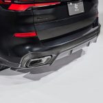 3DDesign Carbon Rear Diffuser for G05 BMW X5 (facelift) Installed on Dark Grey X5 - Close Rear Side View of Diffuser