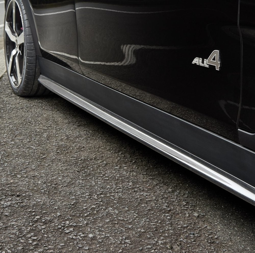 3DDesign Carbon Side Skirts F54 MINI Clubman JCW (facelift) Installed on Black Clubman JCW - Close Front Side View of Car Side