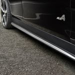 3DDesign Carbon Side Skirts F54 MINI Clubman JCW (facelift) Installed on Black Clubman JCW - Close Front Side View of Car Side