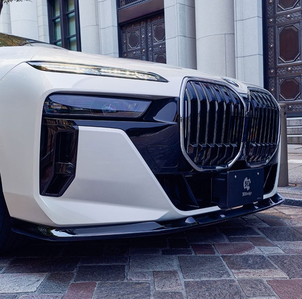 3DDesign Front Lip Spoiler for G70 BMW 740i M Sport / 760i M Sport / i7 M Sport and M70 Installed on White BMW 7 Series - Close Lower Front Side View of Car Front