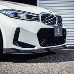 3DDesign Carbon Front Under Splitters for G20 / G21 BMW 320i M Sport, 330i M Sport, and M340i (facelift) Installed on White BMW G21 - Close Front Side View of Front End