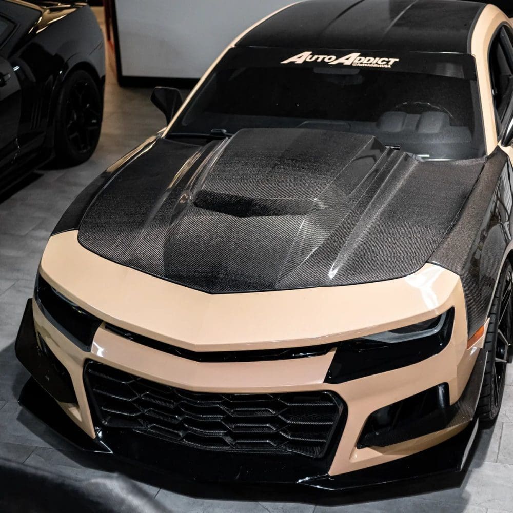 Auto Addict Carbon Type-ZR Double-Sided Hood for G5 Chevrolet Camaro Installed on Tan Camaro - Front Side View of Car