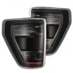 AlphaRex LUXX-Series LED Alpha-Black Tail Lights for P702 Ford F150 (wth BLIS) [RTL-FF21-G2-SA-YS-LB-CVT/RTL-FF21-G2-SA-YS-LB]