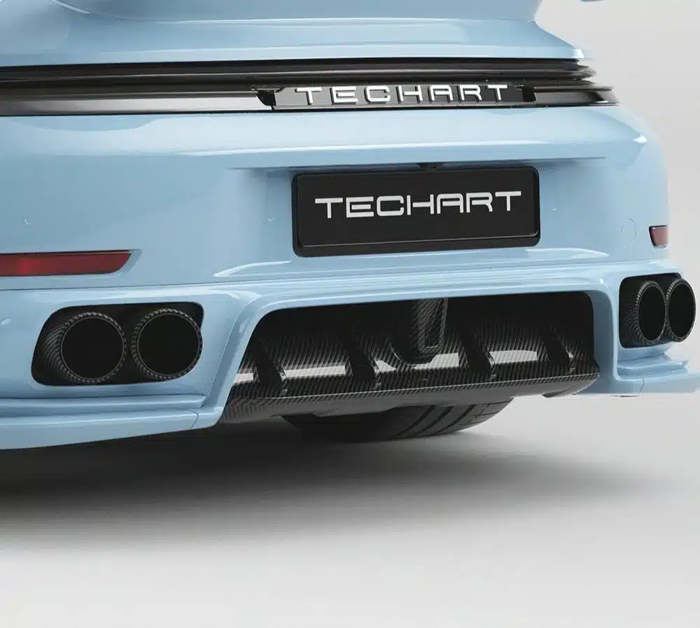 TECHART 992.2 Turbo Tail Pipe Kit Installed on Light Blue 992.2 Turbo S Cabrio - Close Rear Side View of Car