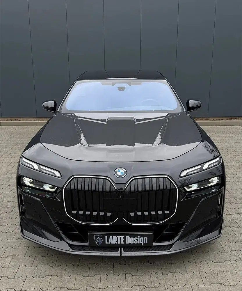 LARTE Design G70 760i Hood in Carbon Fiber, Installed on Dark Grey G0 760i - Upper Front View of Car