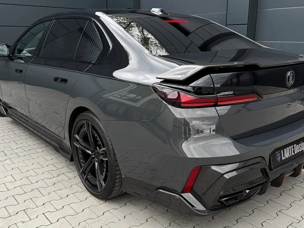 LARTE Design G70 760i Bumper Ailerons in Carbon Fiber, Installed on Dark Grey G70 760i - Rear Side View of Car