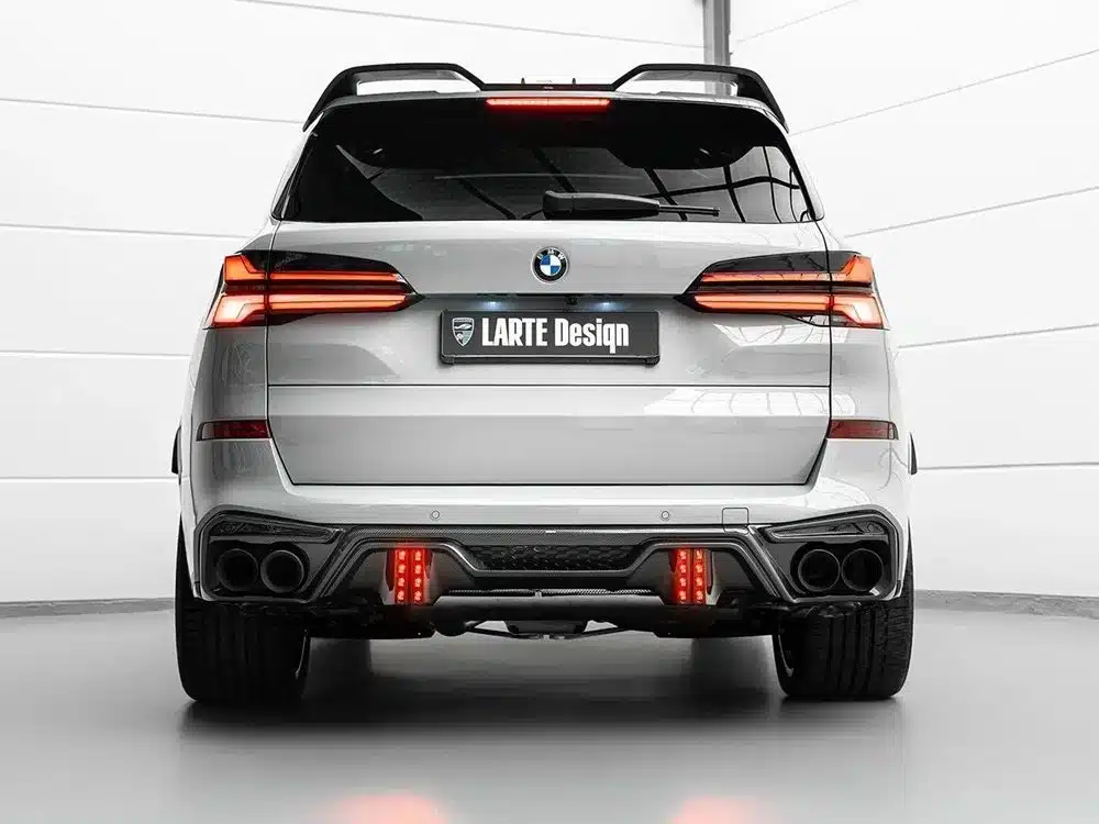 LARTE Design G05 X5 Rear Diffuser in Carbon Fiber with Brake Lights, Installed on Silver LCI G05 X5 - Rear View of Car