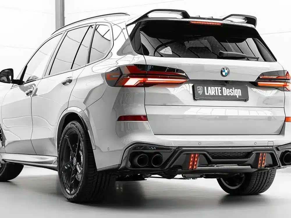 LARTE Design G05 X5 Round Exhaust Tips Installed on Silver LCI G05 X5 - Rear Side View of Car