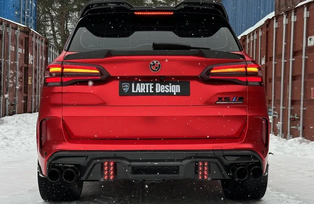 LARTE Design G05 X5 Hatch Spoiler in Carbon Fiber, Installed on Red Pre-LCI G05 X5 - Rear View of Car