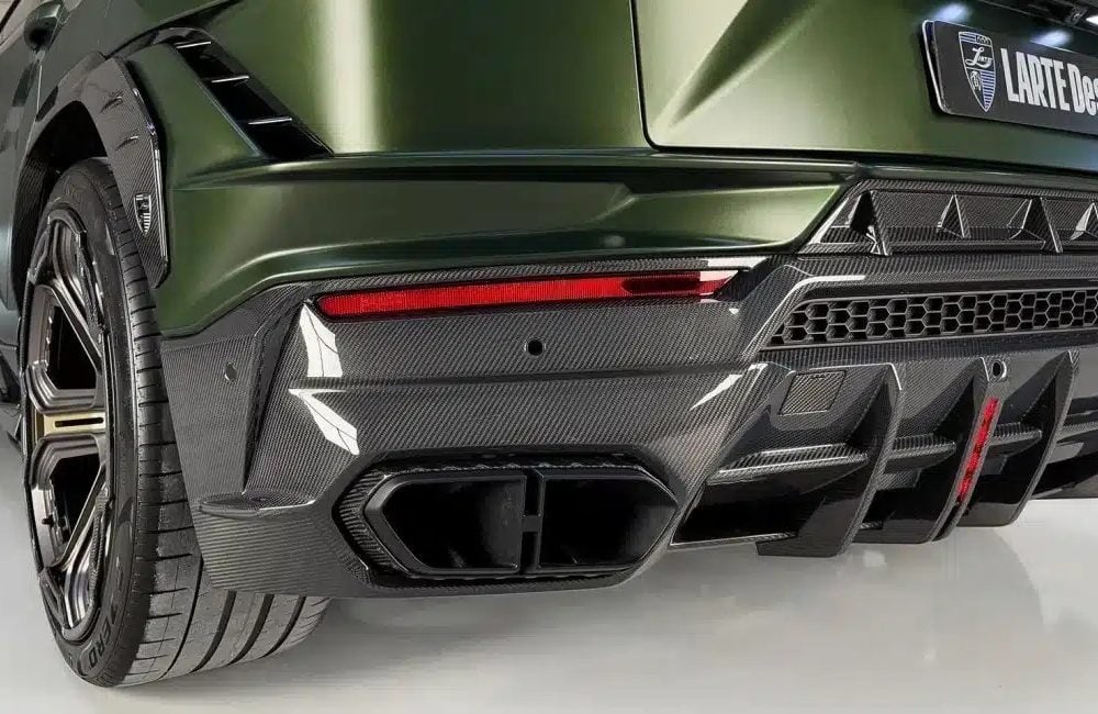 LARTE Design Urus S Exhaust Tips Installed on Matte Green Urus S - Rear Side View of Left Exhaust Tips
