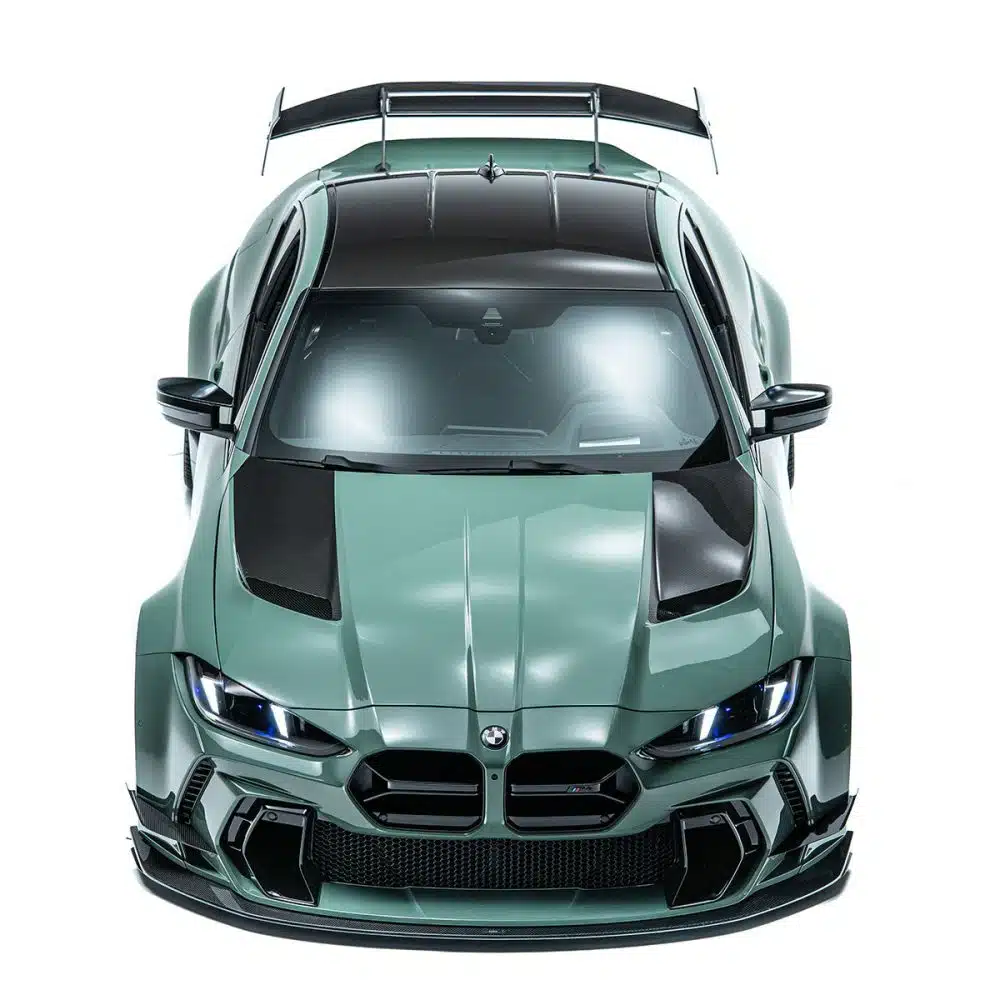 ADRO G82 M4 Widebody Complete Kit on a sage green BMW M4, elevated front view