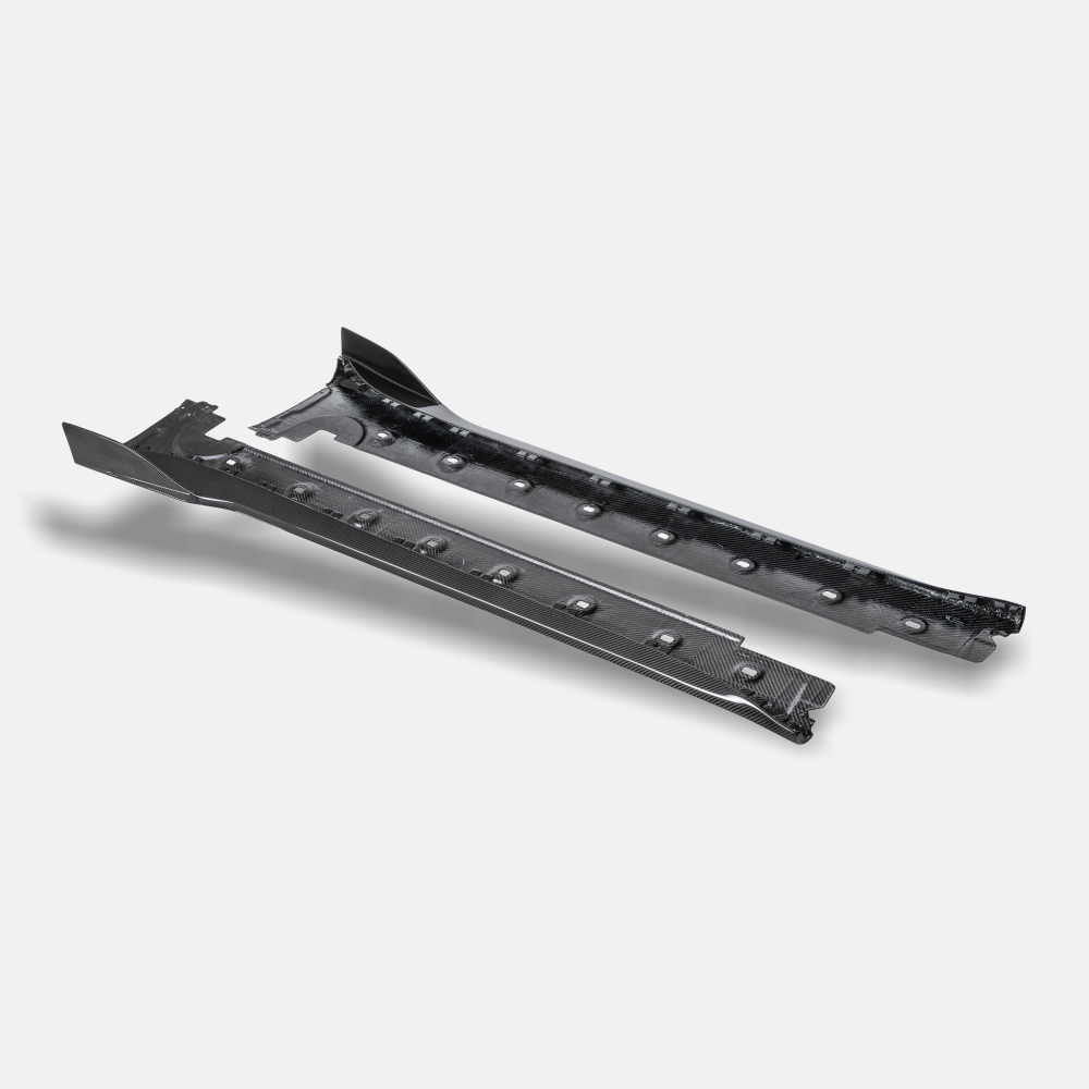 RYFT Carbon Fiber Side Skirts for 992 Porsche 911 Turbo S on the sill of a 992 Turbo S