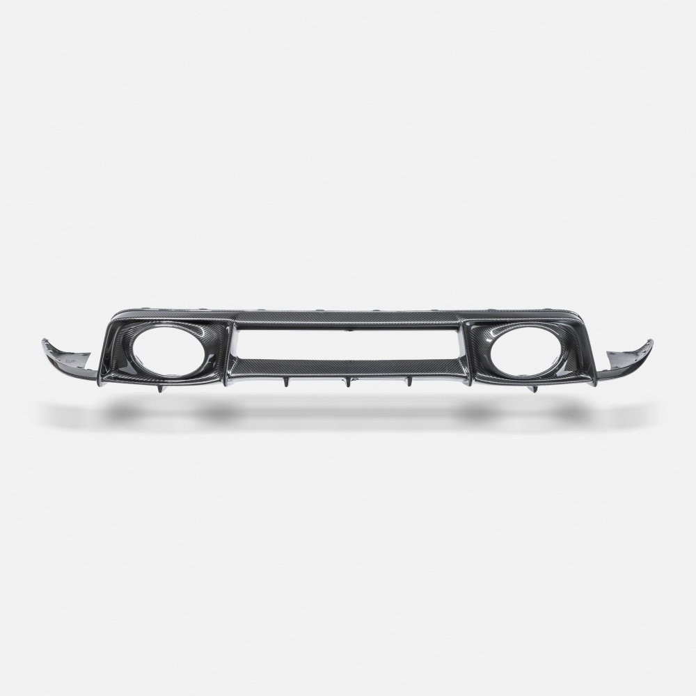 RYFT Carbon Fiber Rear Diffuser for 992 Porsche 911 Turbo S beneath the tailpipes of a 992 Turbo S